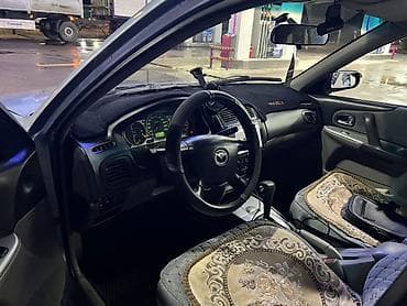 мазда джип: Mazda 323: 2002 г., 1.6 л, Автомат, Бензин, Хэтчбэк — 5