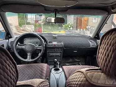 Транспорт: Mazda 323: 1992 г., 1.6 л, Механика, Бензин, Хэтчбэк — 3