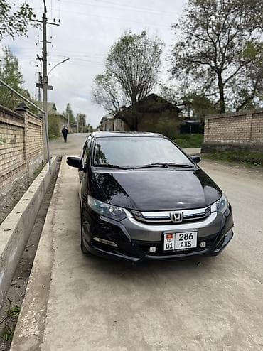 хонда инсайт гибрид: Honda Insight: 2012 г., 1.3 л, Вариатор, Гибрид, Хэтчбэк — 3