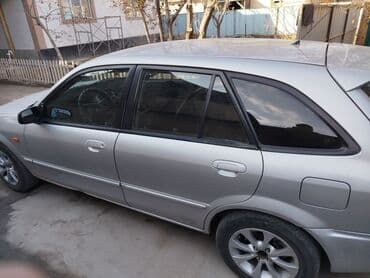 продаю или меняю на недвижимость: Mazda 323: 2002 г., 1.6 л, Механика, Бензин, Хэтчбэк — 6