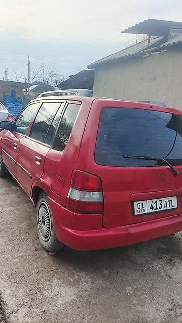 койго алмашам: Mazda Demio: 1998 г., 1.3 л, Кол менен иштөөчү, Бензин, Van — 5