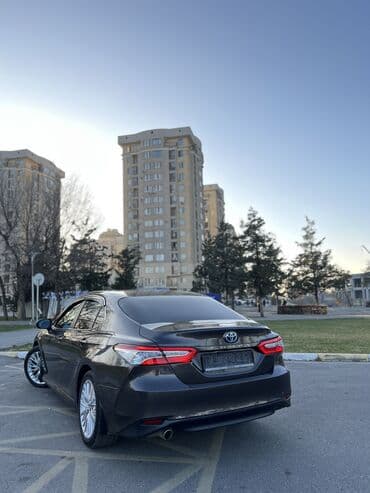 tayota runx: Toyota Camry: 2018 г., 2.5 л, Вариатор, Гибрид, Седан — 5