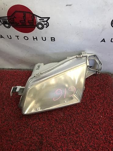 Фара передняя левая для Mazda Familia BJ5W, двигатель 1.5 (1500), год