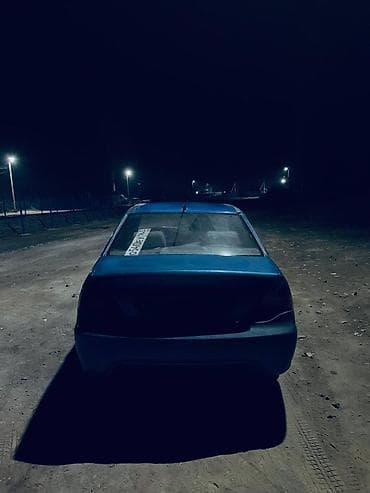 Другие автомобили: Седан синего цвета, 4 двери, передний привод. Кузов с доработанным — 3