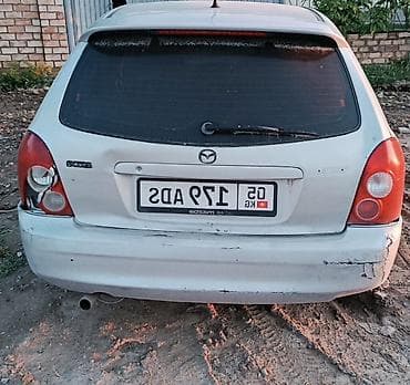 mazda famila: Mazda Familia: 2002 г., 1.6 л, Механика, Бензин, Универсал — 1