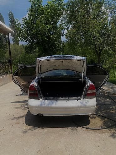 Унаа: Daewoo Nubira: 2001 г., 1.6 л, Кол менен иштөөчү, Бензин, Седан — 4