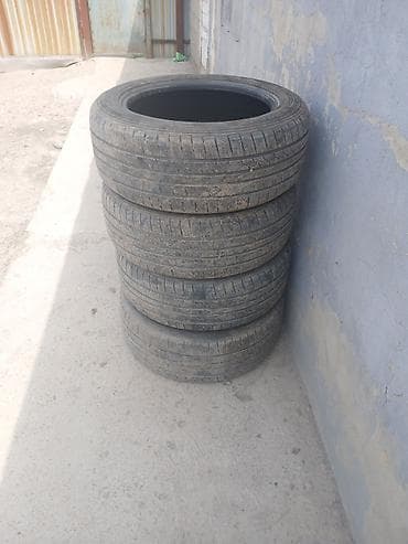 Комплект автомобильных шин (4 шт.) - Размер: 235/55 R18 - Тип