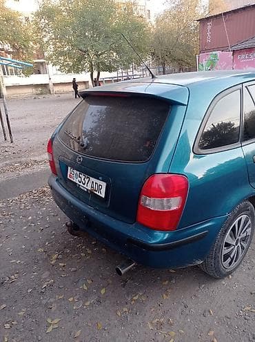 mazda 121: Mazda 323: 1999 г., 1.5 л, Ручные, Бензин, Хэтчбэк — 3