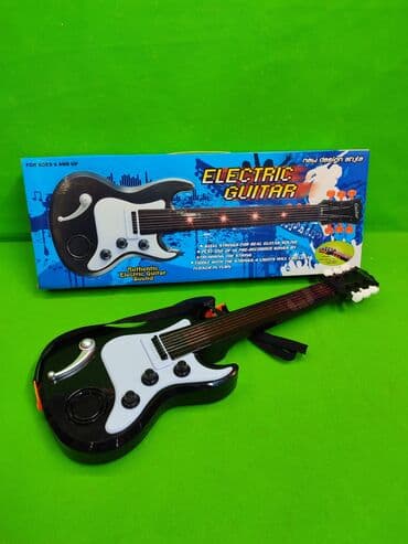 Паркет: Гитара игрушка музыкальная🎸 Комплектация товара: гитара, 3 батарейки✅ — 2