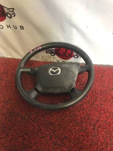 купить диски на машину бу: Руль Mazda — 1