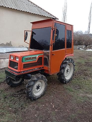 Мини-трактор Hinomoto N200 кабиной - Компактный сельскохозяйственный