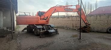 мини кран манипулятор: Экскаватор, Doosan, 2012 г., Колесный — 6