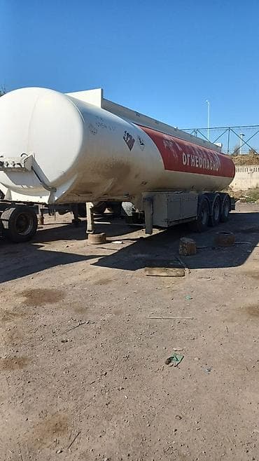прицепы реф: Полуприцеп-цистерна для перевозки светлых нефтепродуктов 4 отсека — 1