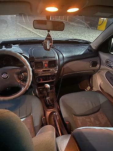 авто г каракол: Nissan Almera: 2002 г., 1.8 л, Кол менен иштөөчү, Бензин, Хетчбек — 5