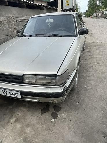 Mazda 626: 1989 г., Седан