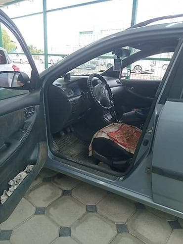 электрик гибрид: Toyota Corolla: 2004 г., Механика, Бензин, Универсал — 4