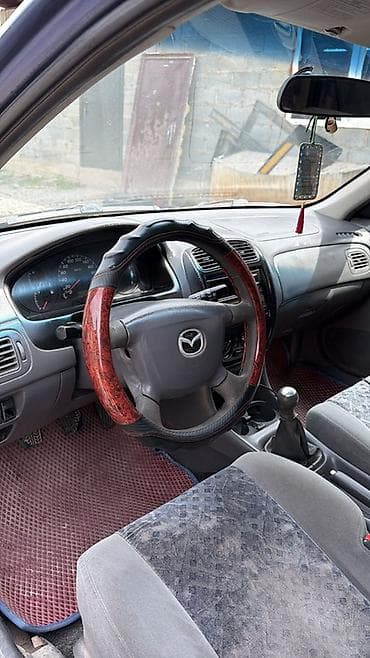 mazda mx5: Mazda 323: 2000 г., 1.6 л, Механика, Бензин, Универсал — 2