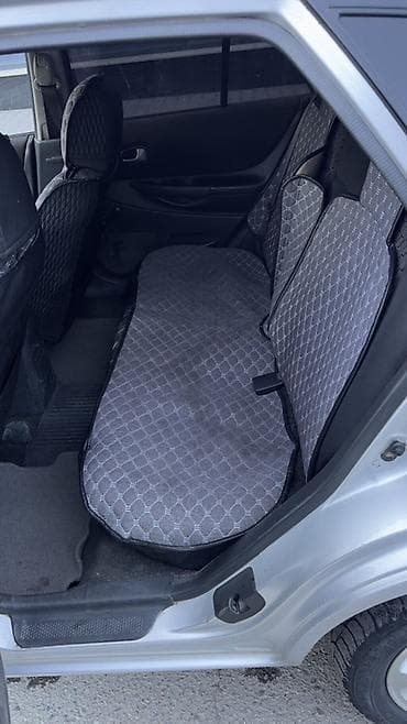 mini kooper: Mazda 323: 2001 г., 1.6 л, Ручные, Бензин, Хэтчбэк — 9