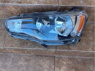 купить фары на ниву: Передняя левая фара Mitsubishi 2008 г., Новый, Аналог — 2