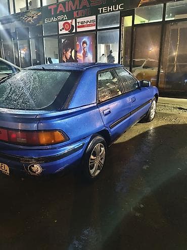 bwm e 34: Mazda 323: 1992 г., 1.6 л, Автомат, Бензин, Хэтчбэк — 5