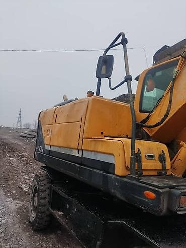 diski bmw: Экскаватор, Hyundai, 2012 г., Колесный — 5