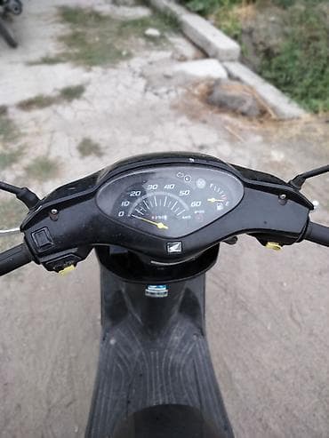Мототехника: Honda Dio — городской скутер в чёрном цвете. Основные характеристики — 2