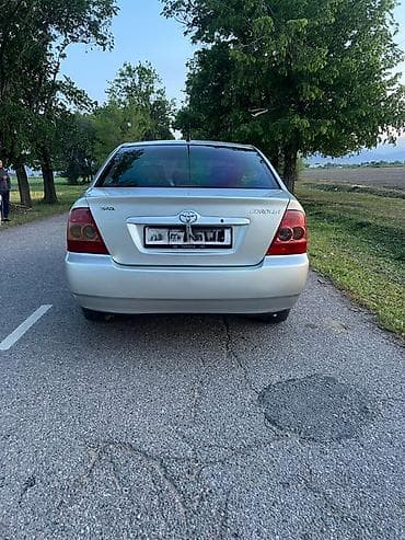 е 318: Toyota Corolla: 2004 г., Автомат, Бензин, Седан — 3