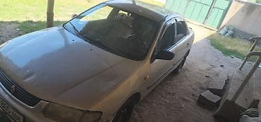 genesis 80: Mazda 323: 1996 г., 1.3 л, Механика, Бензин, Седан — 3