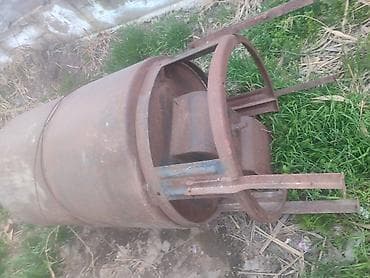 Металлическая печь-буржуйка самодельной конструкции из толстостенной