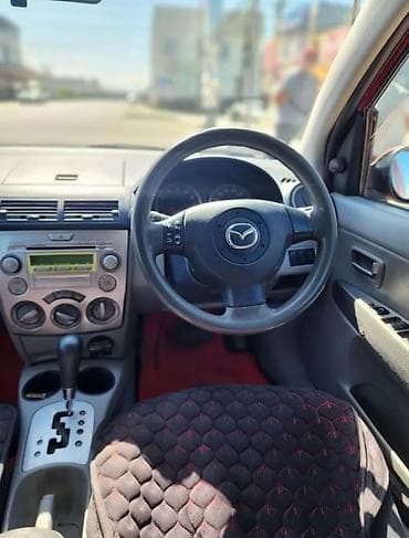 Mazda Demio: 2004 г., 1.5 л, Автомат, Бензин, Хэтчбэк