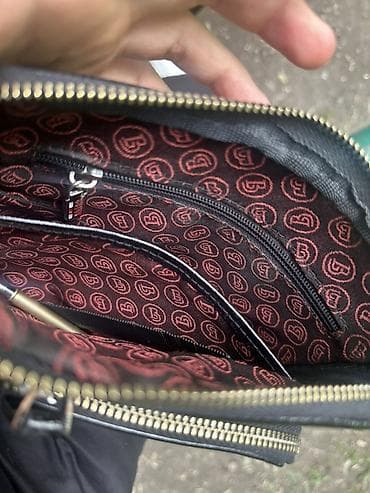 Сумкалар: Барсетка BUTUN
Состояние идеальная 
Обмен на красный ремешок — 3