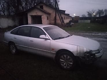 кузов авто: Mazda Lantis: 1992 г., Механика, Бензин, Лифтбек — 5