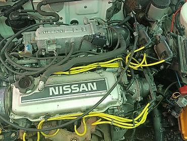 машина byd e2: Nissan Sunny: 1990 г., Бензин, Универсал — 5