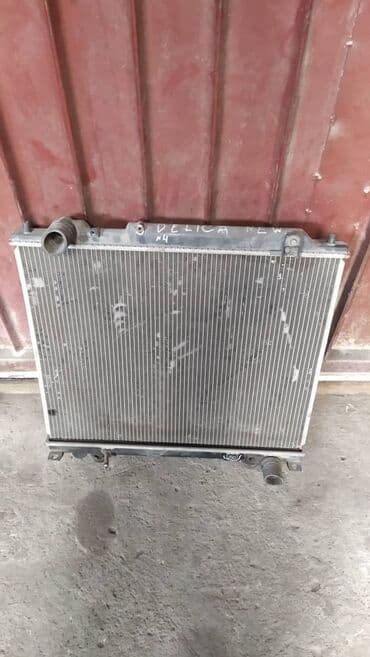 ремонт радиаторов охлаждения автомобилей: Mitsubishi Delica (Булка) радиатор, Митсубиси Делика радиатор — 1