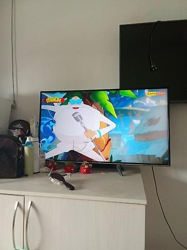 slmsung: Телевизор LED с тонкими рамками, диагональ около 43–50". Экран с — 3