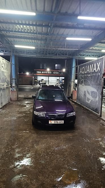 Продажа авто: Mazda 323: 2000 г., Универсал — 9