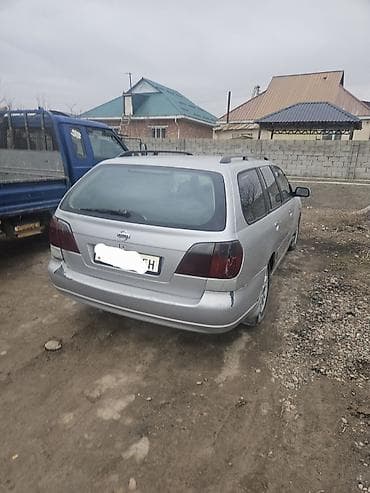 Nissan Primera: 2001 г., Ручные, Бензин, Универсал — 4