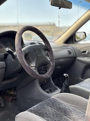 mazda 324: Mazda 323: 1998 г., 1.5 л, Механика, Бензин, Универсал — 8