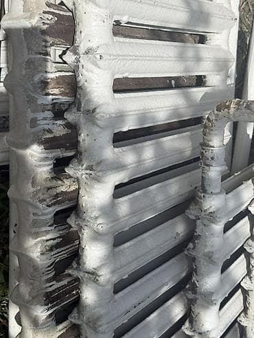 Чугунные секционные радиаторы отопления с горизонтальными ребрами