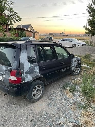 Mazda Demio: 2000 г. — 1