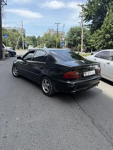 bbs 15: Toyota Avensis: 1999 г., Механика, Бензин, Седан — 4