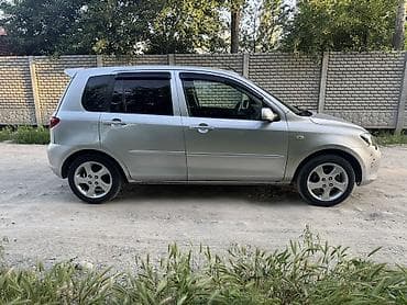 мазда катела: Mazda 2: 2006 г., 1.4 л, Механика, Газ, Хэтчбэк — 5