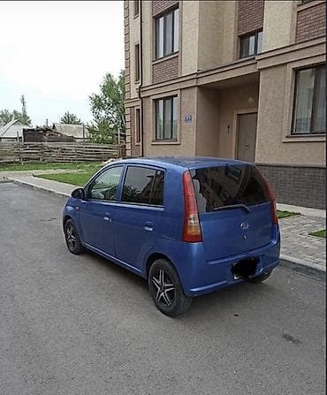 Daihatsu Cuore: 2003 г., 1 л, Механика, Бензин, Универсал — 2