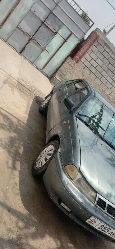 дом на колосах: Daewoo Nexia: 2004 г., 1.5 л, Механика, Бензин, Седан — 4