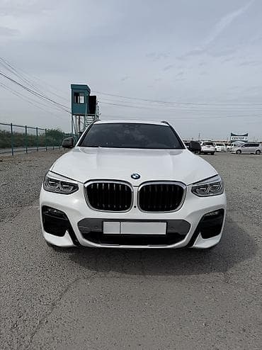 x 7: BMW X4 — интерьер и оснащение - Спортивный кожаный руль M с — 2