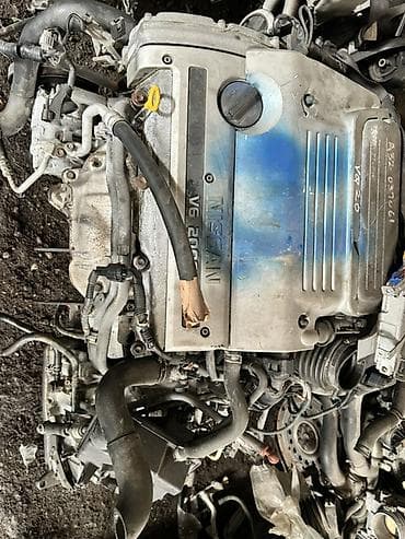 Детали ходовой части: Бензиновый мотор Nissan 2 л — 1
