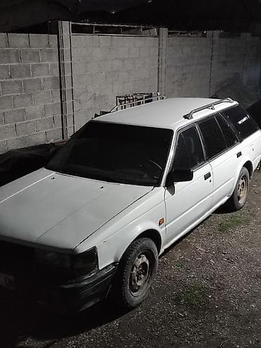 legasy b4: Nissan Bluebird: 1989 г., Механика, Бензин, Универсал — 1