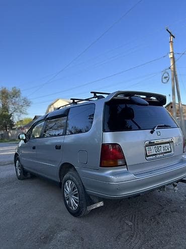 byd e2 фара: Honda Odyssey: 1996 г., 2.2 л, Автомат, Бензин, Минивэн — 5