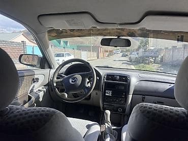 mtz 80: Mazda 626: 2000 г., 1.8 л, Механика, Бензин, Седан — 8