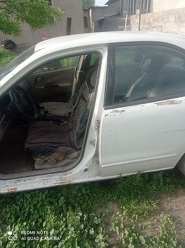 полировка для авто: Разбор на запчасти: седан Daewoo Nubira II (J150), белый цвет — 3